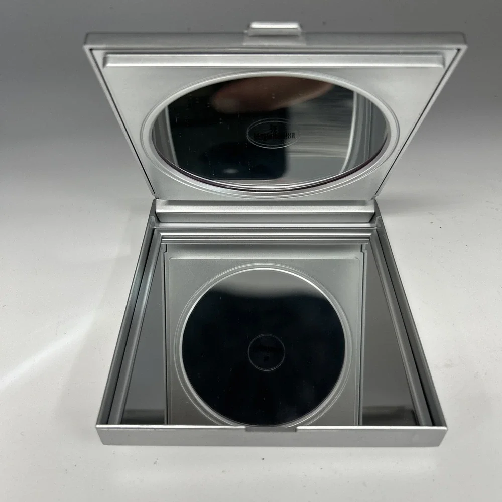 Sensé Beautiful Science compact sleek silver casing built-in mirror